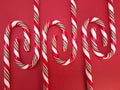 Candycanes candy on a red  background Royalty Free Stock Photo