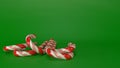 Candycanes with green background