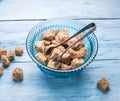 Cane sugar cubes in the old-fashioned glass plate.