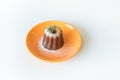 Caneles de bordeaux on plate,traditional French sweet dessert