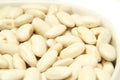 Canellini beans in white bowl Royalty Free Stock Photo