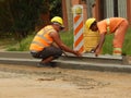 Construction worker building a street..