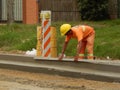 Construction worker building a street..