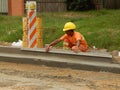 Construction worker building a street..