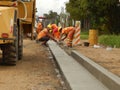 Construction workers building a street..