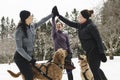 Canicross woman group have fun in winter season