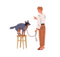 Canine trainer teaching dog. Pet owner training sit down command with purebred doggy, gesturing to puppy with finger