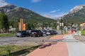 Busy intersection with cars and sidewalks for pedestrians in the city of Canmore in the