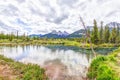 Canmore`s Three Sisters mountain peaks at Policeman Creek in the Canadian Rockies Royalty Free Stock Photo