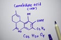 Cannabidiolic Acid - CBDA C22,H30,O4 molecule written on the white board. Structural chemical formula. Education concept