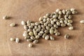 Cannabis seeds of medical hemp plant on wooden board