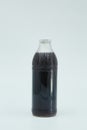 Canned black sauce in a glass bottle. Home canning. Long-term food