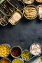 Canned conserve products in tin cans. with fresh organic ingridients Saury, mackerel, sprats, sardines, pilchard, squid, tuna Royalty Free Stock Photo