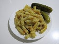 Canned cucumbers and spiral pasta