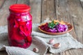 Canned fermented cabbage with beets, carrots and garlic in a glass can Royalty Free Stock Photo