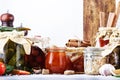 Canned food concept. Fermented, pickled, marinated preserved vegetarian food. Organic vegetables and fruits in jars with spice and Royalty Free Stock Photo