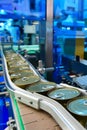 Canned food products on conveyor belt in distribution warehouse Royalty Free Stock Photo