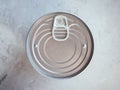 Canned foods in tin can on concrete grey background. Non-perishable, long shelf life food for survival in emergency Royalty Free Stock Photo