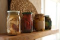 Canned foods on wooden shelf in kitchen Royalty Free Stock Photo