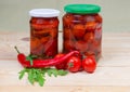 Canned and fresh peppers chili and cherry tomatoes Royalty Free Stock Photo