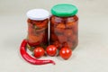 Canned and fresh peppers chili and cherry tomatoes Royalty Free Stock Photo