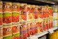 Canned Tomatoes On a Supermarket Shelf