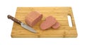 Canned meat on cutting board with knife Royalty Free Stock Photo