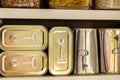 Canned meat food cans stored on kitchen shelf Royalty Free Stock Photo