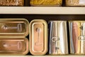 Canned meat food cans stored on kitchen shelf Royalty Free Stock Photo