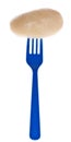 Canned New Potato on a Vibrant Blue Fork.