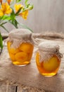 Canned peach compote in glass jars sweet traditional food