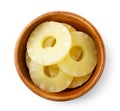 Canned pineapple rings in a plate on a white background, isolated. Top view Royalty Free Stock Photo