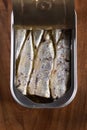 Canned sardine on wooden Royalty Free Stock Photo