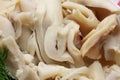 Canned sliced squid as a background close-up Royalty Free Stock Photo