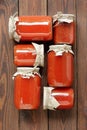 Canned tomato paste in plastic free sustainable jars, conserves for winter eat, flat lay, from above overhead top view