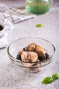 Canned tuna chunks in a bowl on the table vertical view Royalty Free Stock Photo