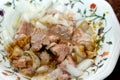 Canned tuna fish meat food with sunflower oil, cumin and slices of onions served in a plate, a closeup view of Tuna meat Royalty Free Stock Photo