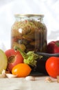 Canned vegetables cutting board eggplant tomato garlic Royalty Free Stock Photo