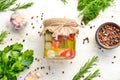 Canned vegetables in a glass jar. Food stocks.