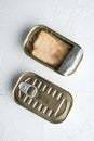 Canned Wild Alaska Salmon, in tin can, on white background, top view flat lay