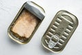 Canned Wild Alaska Salmon, in tin can, on white background, top view flat lay