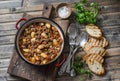 Cannellini beans beef slow-cooker stew on the wooden table, top view. Royalty Free Stock Photo