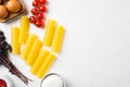 Cannelloni with spinach and ricotta, on white stone table background, top view flat lay, with copy space for text Royalty Free Stock Photo