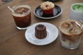 Cannele with coffee and bakery. Flavored with rum and vanilla and baked in a copper mold.