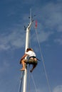 Sailor climbing mast Royalty Free Stock Photo