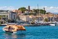 Cannes seafront panorama with castle hill over historic old town Centre Ville and yacht port at French Riviera in France
