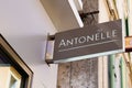 Antonelle logo brand and sign text front wall trendy boutique fashion clothes shop for women