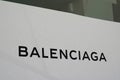 Balenciaga store exterior brand text and sign logo on windows fashion shop