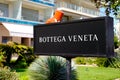Bottega veneta logo sign and brand text on store facade fashion clothing shop entrance