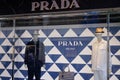 Prada logo sign and text brand on store facade entrance shop